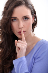 Naklejka premium Woman asking for quiet