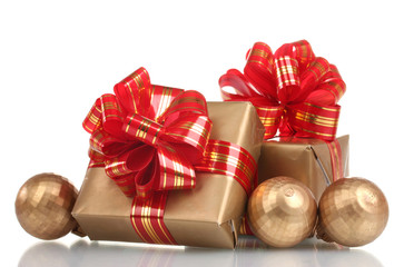 beautiful golden gifts with red ribbon and Christmas balls