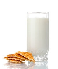 glass of milk and cookies isolated on white