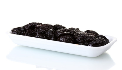 yummy dried plums in packaging isolated on white