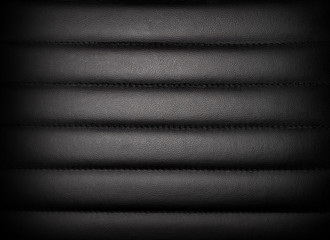 Dark  leather padded leather or vinyl upholstery texture