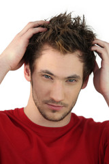 Man scratching his head