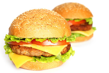 Big hamburgers on white background