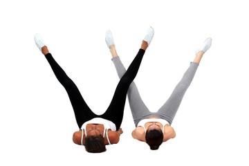 Two ballet dancers stretching