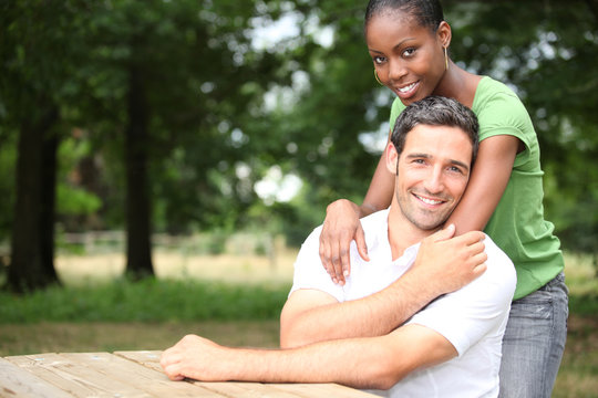 Racially Mixed Couple In The Forest