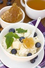Dietary breakfast -cottage cheese, honey and fresh berry