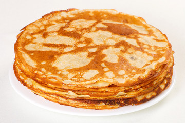 Stack of pancakes isolated on white background