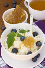 Dieting cottage cheese with honey and blueberries