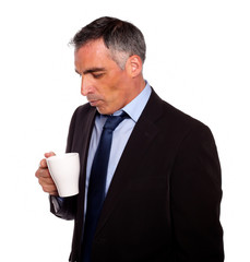 Businessman looking to a empty mug