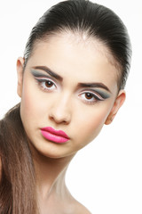 studio portrait of young beautiful woman with bright makeup isol