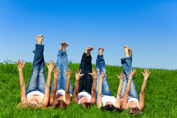 Women with towel on meadow
