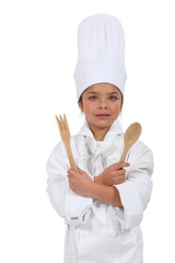 little girl dressed as cook