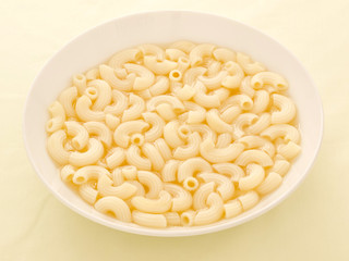 close up of a bowl of macaroni soup