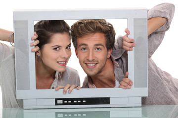 Couple in an empty television screen