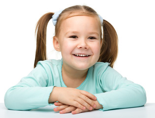 Naklejka premium Portrait of a cute little girl