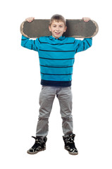 Fototapeta premium Handsome smiling teenage boy with skateboard