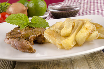 lamb steak with french fries