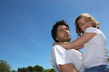 Father and daughter in summer