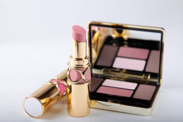 eyeshadow palette with mirror and lipsticks