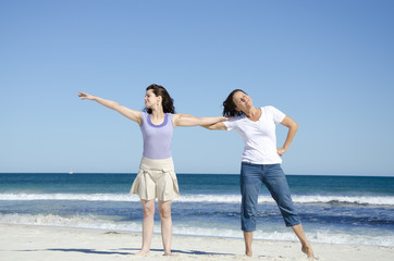 Two women having fun at the beach