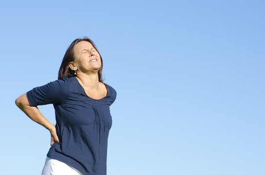 Mature Woman Suffering From Back Pain