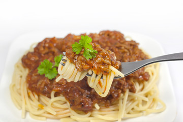 pasta bolognese on fork