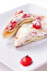 Mascarpone cheese pancakes with fresh strawberries