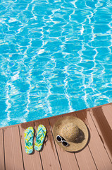 flip-flop near swimming pool