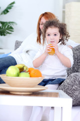 little girl drinking juice