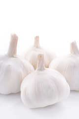 Fresh four garlics on white background