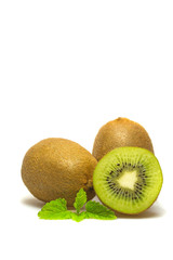 Whole and half kiwi. Isolated. Vertically.