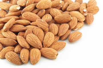 Almonds on white background