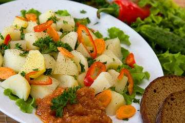 Boiled potatoes with vegetables