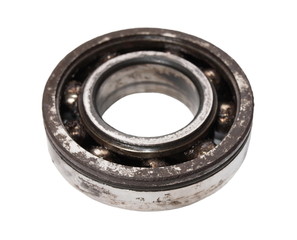 Old rusty metal ball bearing isolated on white background