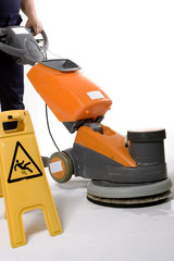 cleaning floor with machine