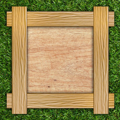 wooden board on grass
