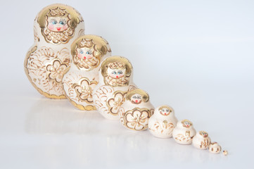 Matryoshka, a Russian wooden doll on a white background