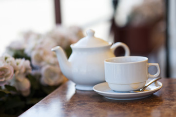 White cup on the table