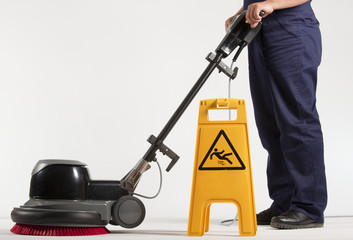 cleaning floor with machine