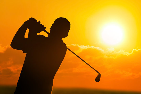 Photo of a Golfer in  Sunset