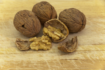 walnuts on wood background