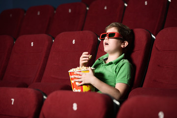 Alone boy at the cinema
