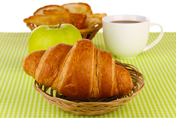 Classical breakfast. Coffee and croissant