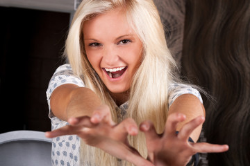 Shocking blond girl screaming