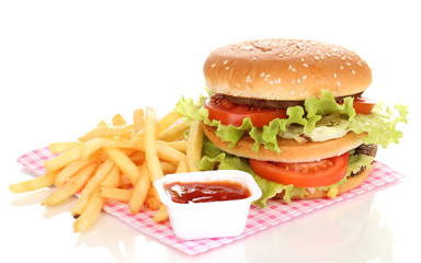 Big and tasty hamburger and fried potatoes isolated on white