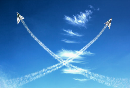 Two hundred dollars planes on cloudy sky and trace.