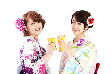 Beautiful kimono women drinking beer