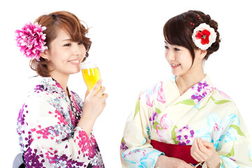 Beautiful kimono women drinking beer