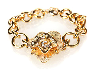 Beautiful golden bracelet with precious stones isolated on