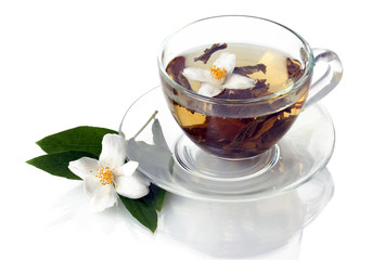 cup of green tea with jasmine flowers isolated on white